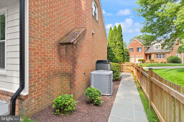 10000 Manor Pl, Fairfax, VA 22032 - view of property exterior with central AC and brick siding