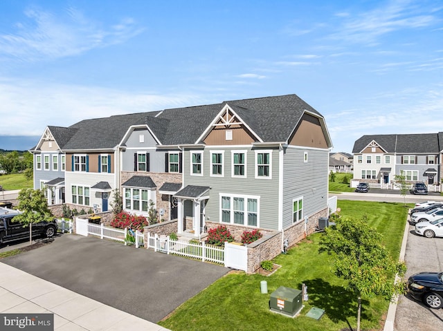 8 Ryan Ct, Gilbertsville, PA 19525 - townhome / multi-family property with stone siding, board and batten siding, roof with shingles, and a residential view