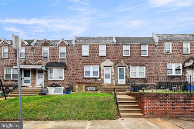 4528 Tudor St, Philadelphia, PA 19136 - multi unit property featuring entry steps, brick siding, a front lawn, and a residential view
