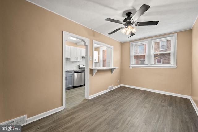 4528 Tudor St, Philadelphia, PA 19136 - unfurnished room with dark wood finished floors, baseboards, and ceiling fan