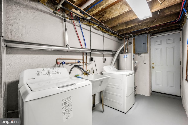 4528 Tudor St, Philadelphia, PA 19136 - laundry area with electric panel, washing machine and dryer, and gas water heater