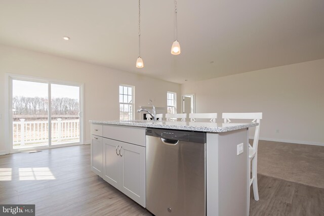 1019 Robinson Rd, Townsend, DE 19734 - kitchen with dishwasher, light wood-style flooring, a center island with sink, pendant lighting, and baseboards