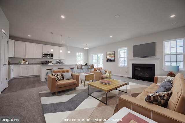 1019 Robinson Rd, Townsend, DE 19734 - living room with recessed lighting, a fireplace with flush hearth, and baseboards