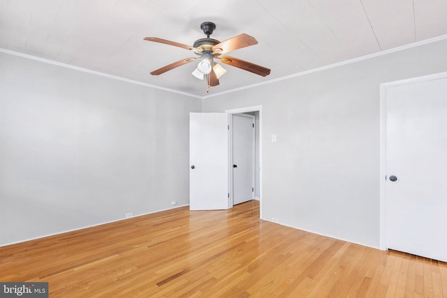 1936 S Sartain St, Philadelphia, PA 19148 - spare room with light wood finished floors, a ceiling fan, and crown molding