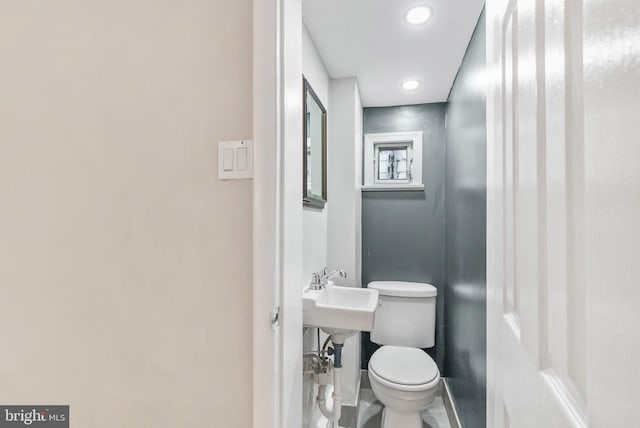1936 S Sartain St, Philadelphia, PA 19148 - half bathroom with toilet, baseboards, and recessed lighting