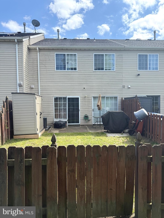 59 Sassafras Dr, Lumberton, NJ 08060 - back of house with a fenced backyard, a patio, and a shed