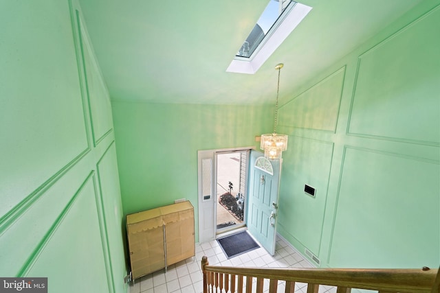 59 Sassafras Dr, Lumberton, NJ 08060 - bedroom featuring a skylight, light tile patterned floors, a chandelier, and access to outside