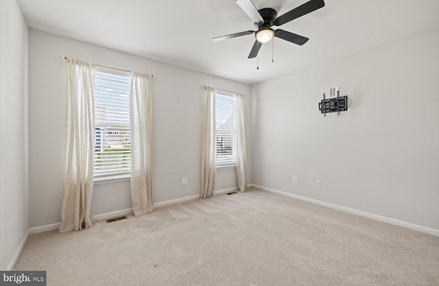 25040 Treeview Ln, Lewes, DE 19958 - spare room featuring carpet, baseboards, and ceiling fan