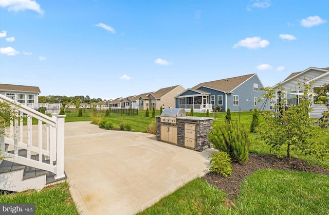 25040 Treeview Ln, Lewes, DE 19958 - view of patio featuring a residential view and grilling area