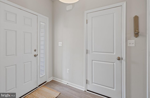 25040 Treeview Ln, Lewes, DE 19958 - entryway with wood finished floors and baseboards