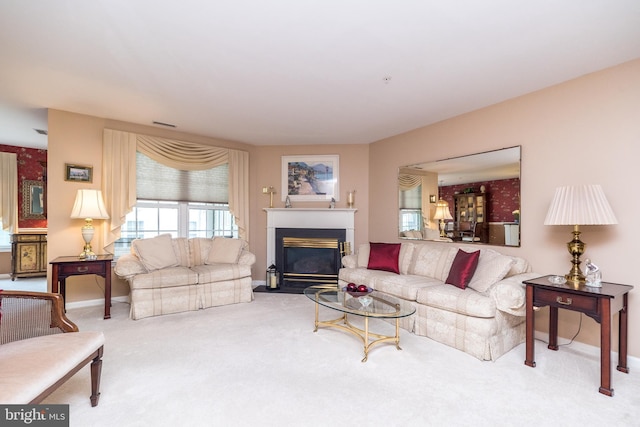 205 Strawberry Ct, Warwick, PA 18974 - living area with carpet, a fireplace with flush hearth, and baseboards