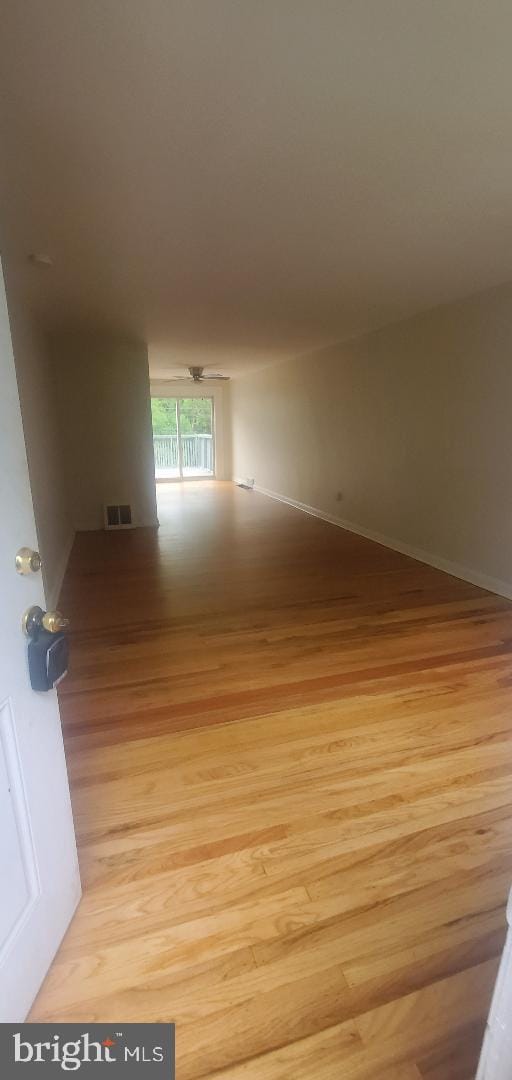 5016 Palmer Mill Rd, Clifton Heights, PA 19018 - empty room featuring wood finished floors and baseboards