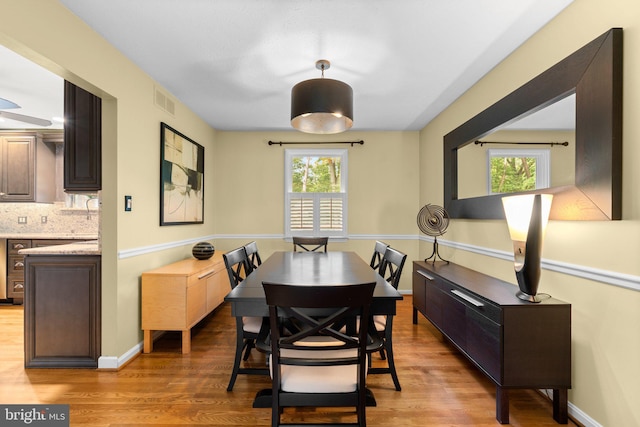260 Whistling Pine Rd, Severna Park, MD 21146 - dining area featuring light wood-style floors and baseboards