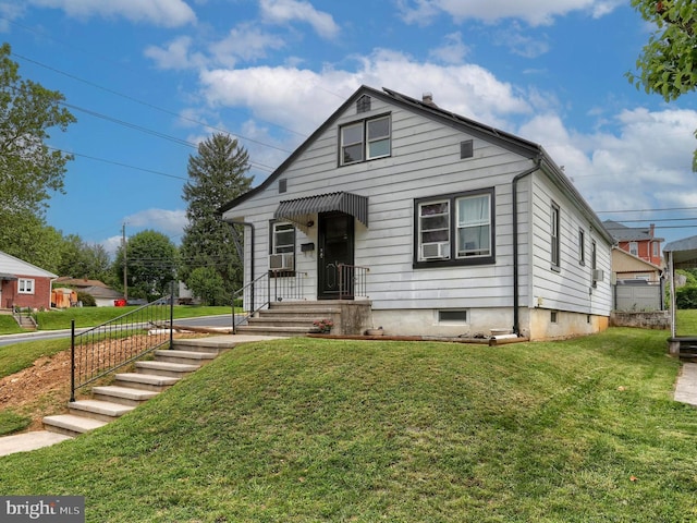 1 E Chestnut St, Cleona, PA 17042 - view of front of property featuring a front yard and cooling unit