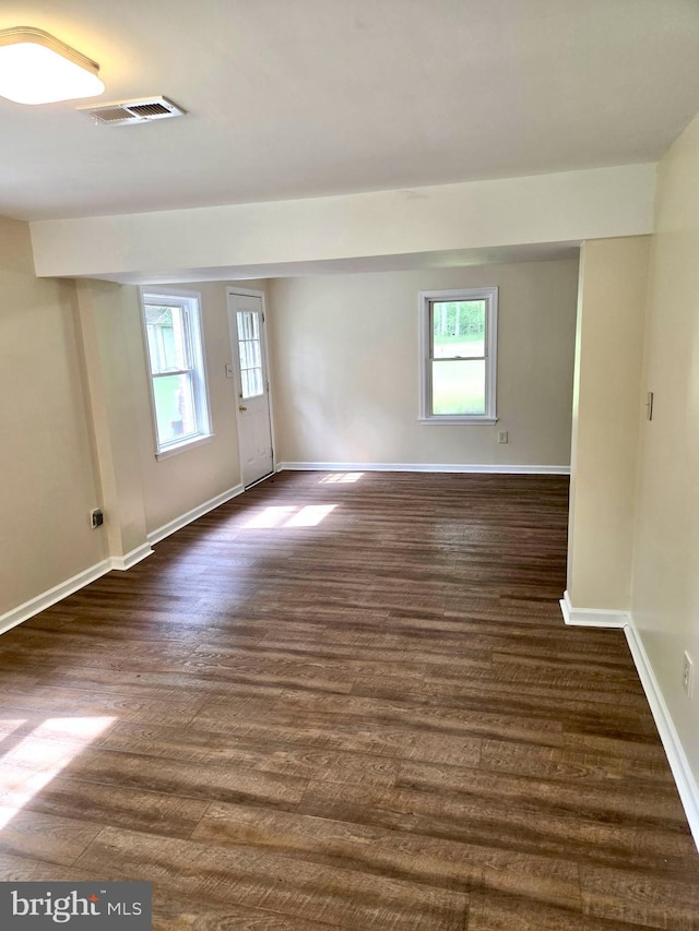 2404 Woodlea Dr, Joppa, MD 21085 - unfurnished room featuring baseboards and dark wood-style floors