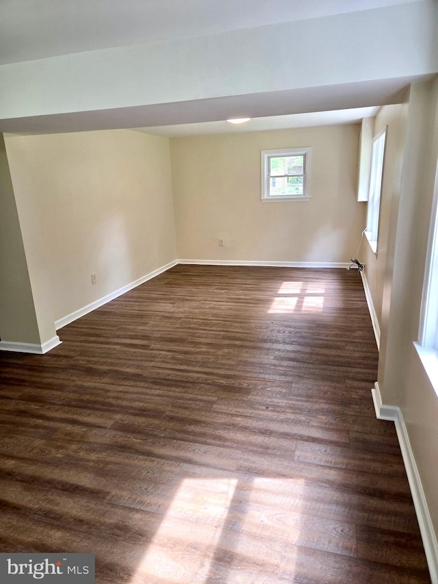 2404 Woodlea Dr, Joppa, MD 21085 - unfurnished room with baseboards and dark wood finished floors