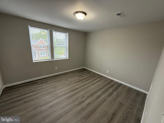 1727 Dallas St, Philadelphia, PA 19126 - unfurnished room featuring dark wood-style flooring and baseboards