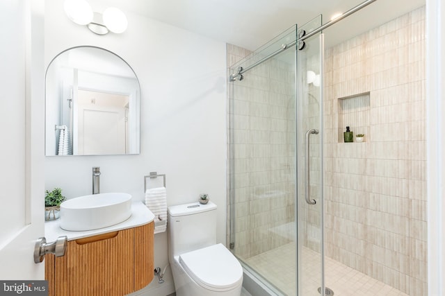 903 Corinthian Ave Unit B, Philadelphia, PA 19130 - full bathroom featuring vanity, toilet, and a shower stall