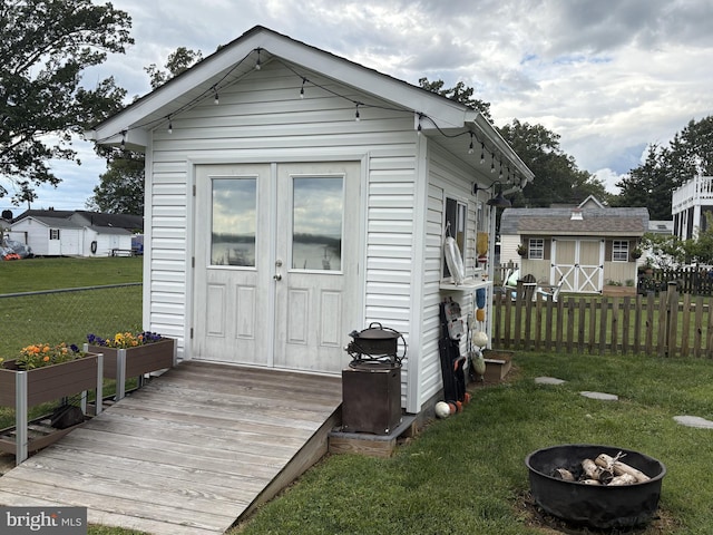 527 Monroe Bay Ave, Colonial Beach, VA 22443 - rear view of house featuring a fire pit