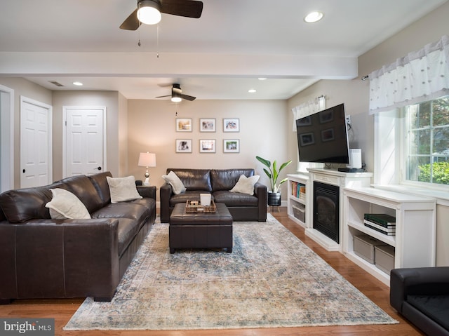 1204 Drexel Ave, Drexel Hill, PA 19026 - living area featuring ceiling fan, recessed lighting, wood finished floors, and a glass covered fireplace