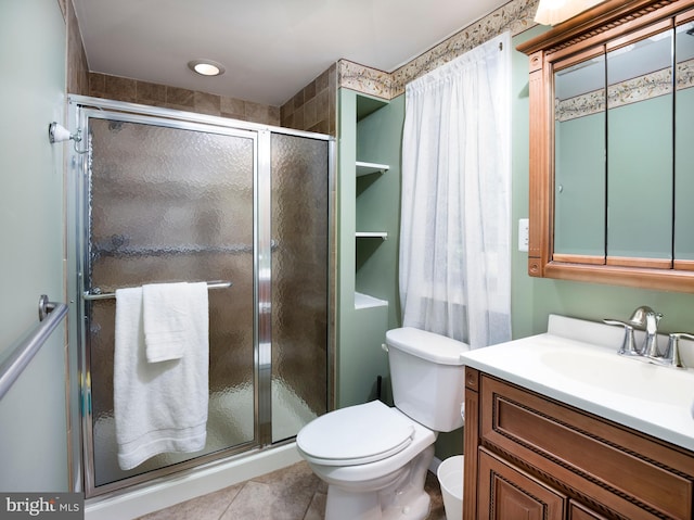 1204 Drexel Ave, Drexel Hill, PA 19026 - bathroom featuring toilet, vanity, a stall shower, and tile patterned floors