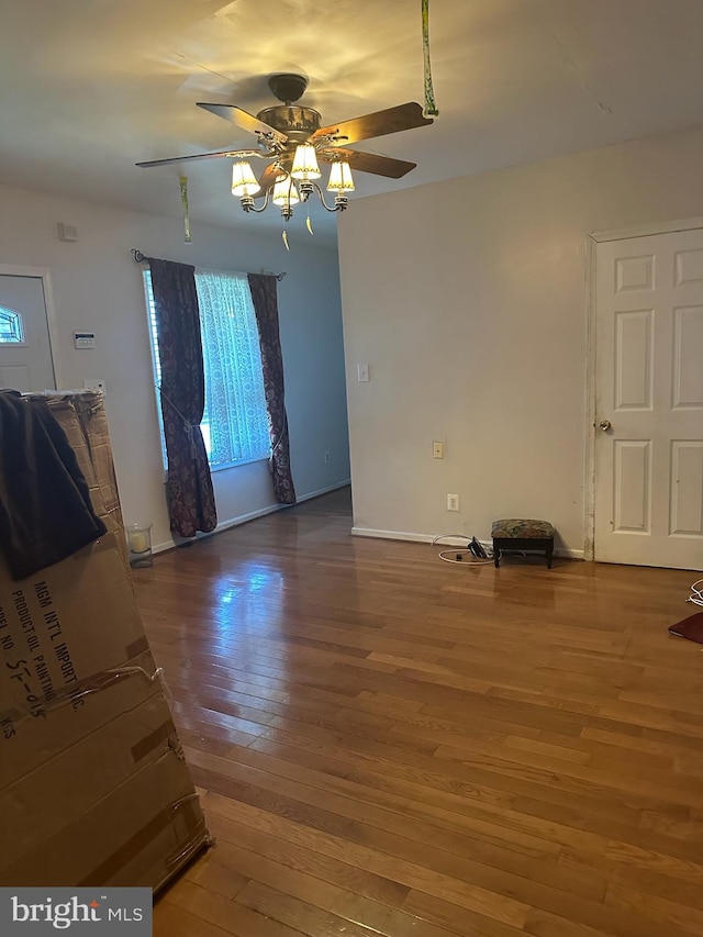 1021 W 7th St, Chester, PA 19013 - unfurnished room with wood-type flooring, a ceiling fan, and baseboards