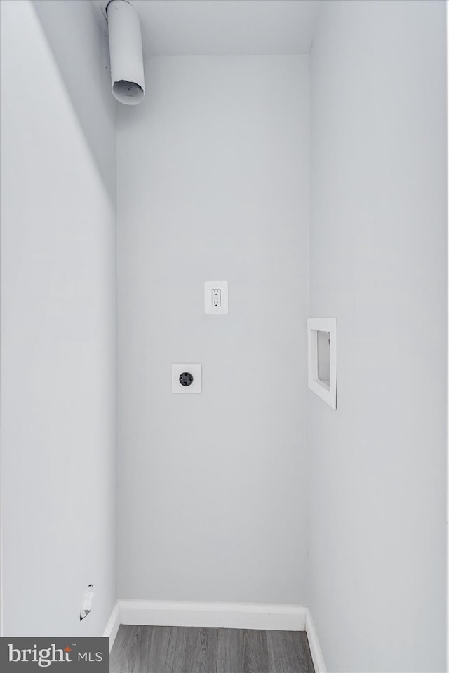 2005 Magnolia Woods Ct Unit 2005-D, Edgewood, MD 21040 - laundry area featuring washer hookup, hookup for an electric dryer, baseboards, wood finished floors, and hookup for a gas dryer