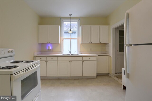 154 S Baltimore St, Dillsburg, PA 17019 - kitchen featuring white appliances, a sink, light flooring, and white cabinetry