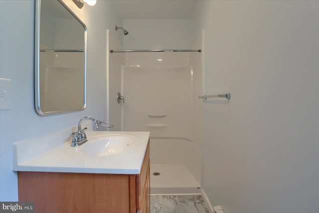 154 S Baltimore St, Dillsburg, PA 17019 - full bathroom with vanity, a shower, marble look tiles, and baseboards