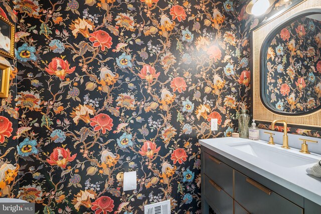 253 Lantern Ln, Gulph Mills, PA 19428 - bathroom with wallpapered walls and vanity