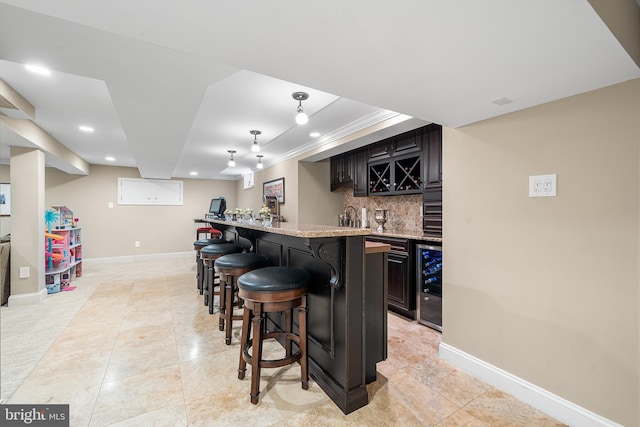 253 Lantern Ln, Gulph Mills, PA 19428 - indoor wet bar with decorative backsplash, recessed lighting, wine cooler, baseboards, and light tile patterned floors