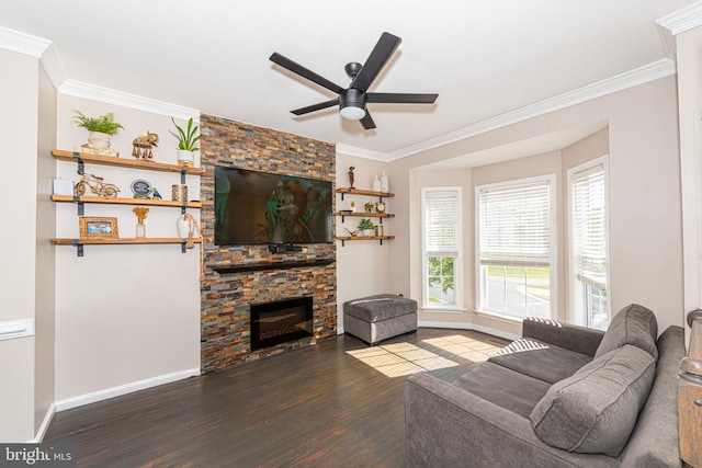 15381 Bronco Way, Woodbridge, VA 22193 - living room featuring wood finished floors, crown molding, baseboards, a stone fireplace, and ceiling fan