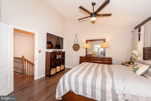 15381 Bronco Way, Woodbridge, VA 22193 - bedroom featuring wood finished floors, vaulted ceiling, and baseboards