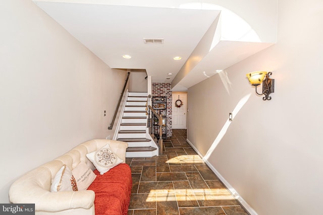 15381 Bronco Way, Woodbridge, VA 22193 - staircase with stone tile floors, baseboards, and recessed lighting