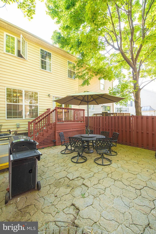 15381 Bronco Way, Woodbridge, VA 22193 - view of patio / terrace featuring outdoor dining area and a deck