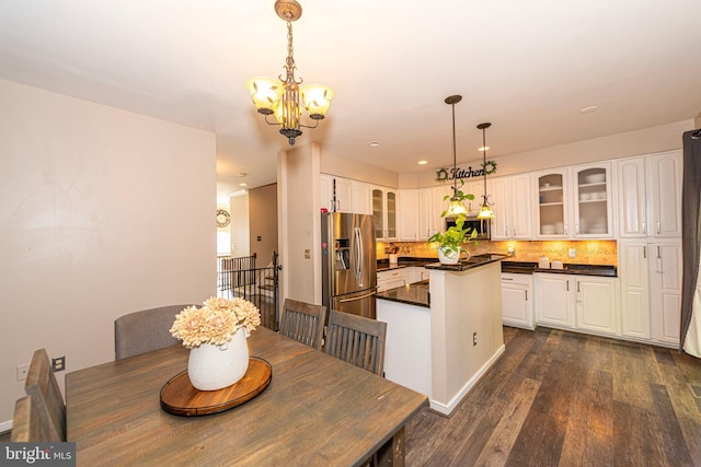 15381 Bronco Way, Woodbridge, VA 22193 - dining room featuring dark wood-style flooring, a chandelier, and recessed lighting