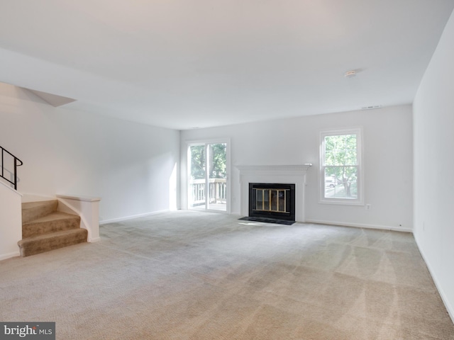 1447 Chatham Ct, Crofton, MD 21114 - unfurnished living room featuring stairs, carpet, a fireplace with flush hearth, and baseboards