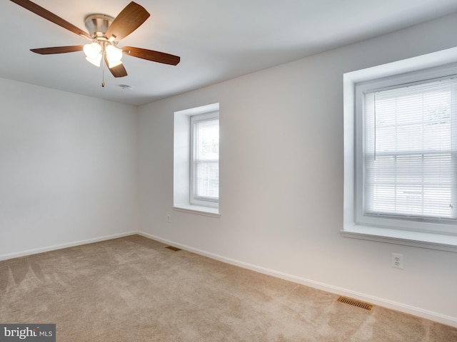 1447 Chatham Ct, Crofton, MD 21114 - unfurnished room featuring light colored carpet, baseboards, and a ceiling fan
