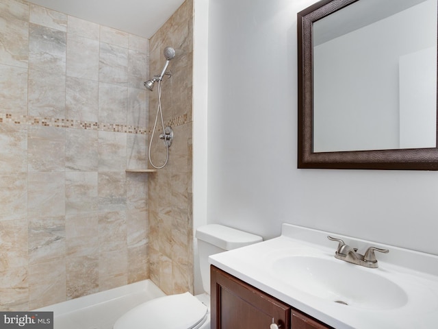 1447 Chatham Ct, Crofton, MD 21114 - bathroom featuring a tile shower, vanity, and toilet