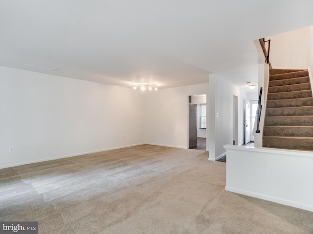 1447 Chatham Ct, Crofton, MD 21114 - unfurnished living room featuring light carpet, stairway, and baseboards