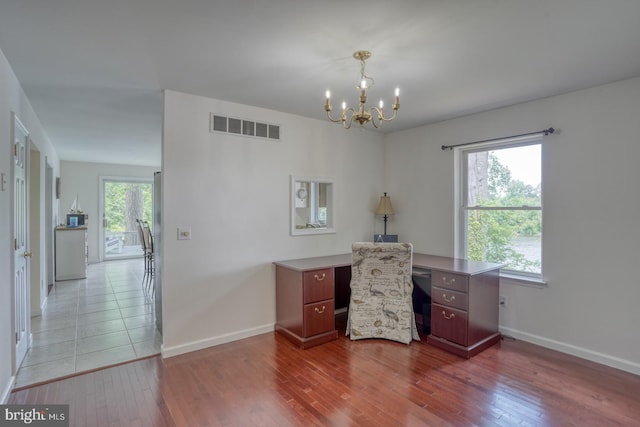 45 S Shore Dr, Dover, DE 19901 - office area with a chandelier, wood-type flooring, and baseboards