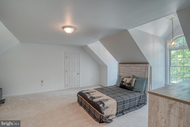 45 S Shore Dr, Dover, DE 19901 - bedroom featuring lofted ceiling, carpet, and a chandelier