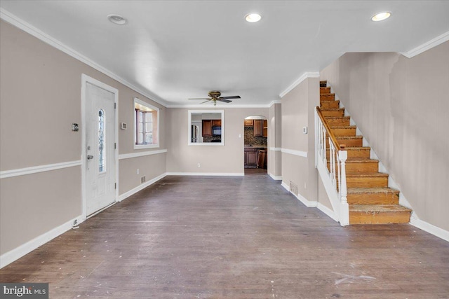 7175 Lee Ave, Pennsauken, NJ 08110 - foyer entrance featuring arched walkways, crown molding, a ceiling fan, stairway, and wood finished floors