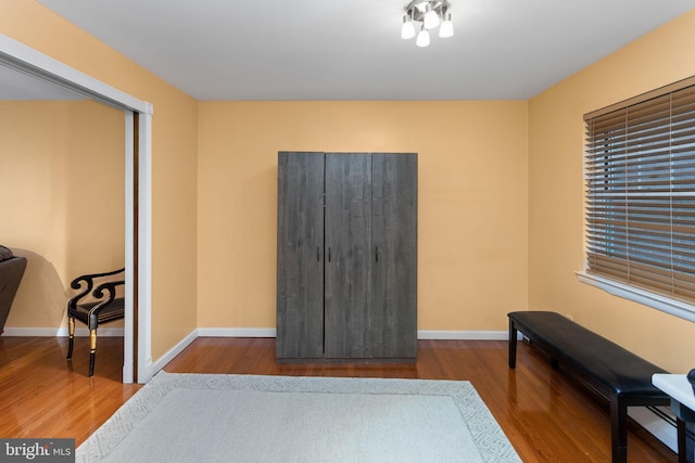 132 The Orchards Unit I, East Windsor, NJ 08520 - bedroom with wood finished floors, baseboards, and a baseboard heating unit
