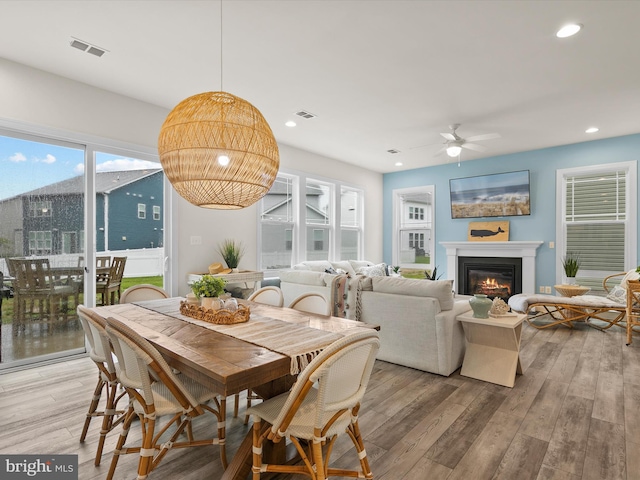 41 Beach Club Ave, Ocean View, DE 19970 - dining space with a ceiling fan, light wood-style flooring, a glass covered fireplace, and recessed lighting