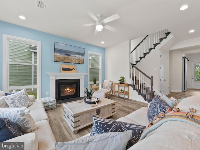 41 Beach Club Ave, Ocean View, DE 19970 - living area featuring stairway, wood finished floors, ceiling fan, and recessed lighting