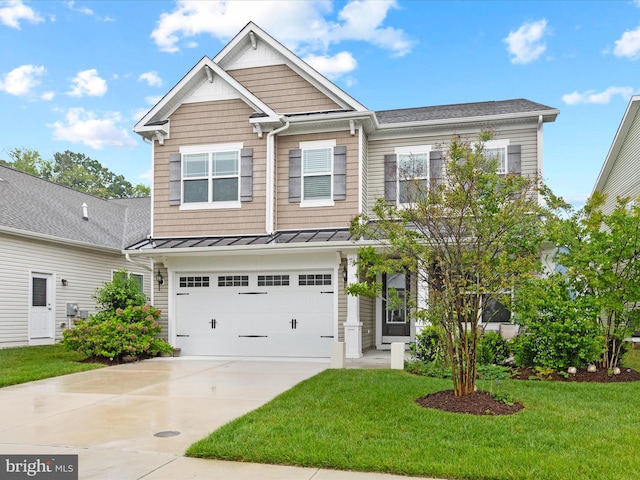 41 Beach Club Ave, Ocean View, DE 19970 - view of front of house with concrete driveway, an attached garage, a front yard, a standing seam roof, and metal roof