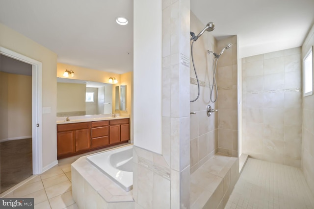 4504 Eden Park Ln, Upper Marlboro, MD 20772 - full bath with tiled shower, double vanity, healthy amount of natural light, and tile patterned flooring