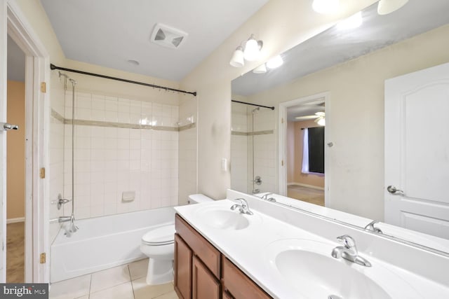 4504 Eden Park Ln, Upper Marlboro, MD 20772 - full bathroom with  shower combination, double vanity, tile patterned flooring, toilet, and ceiling fan