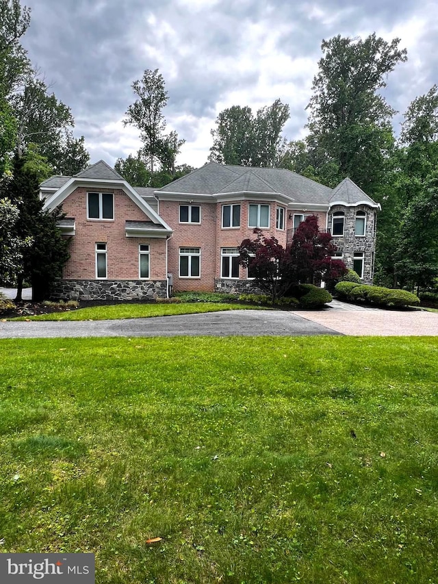 2610 Chestnut Woods Ct, Reisterstown, MD 21136 - view of front of property featuring a front yard, stone siding, and brick siding